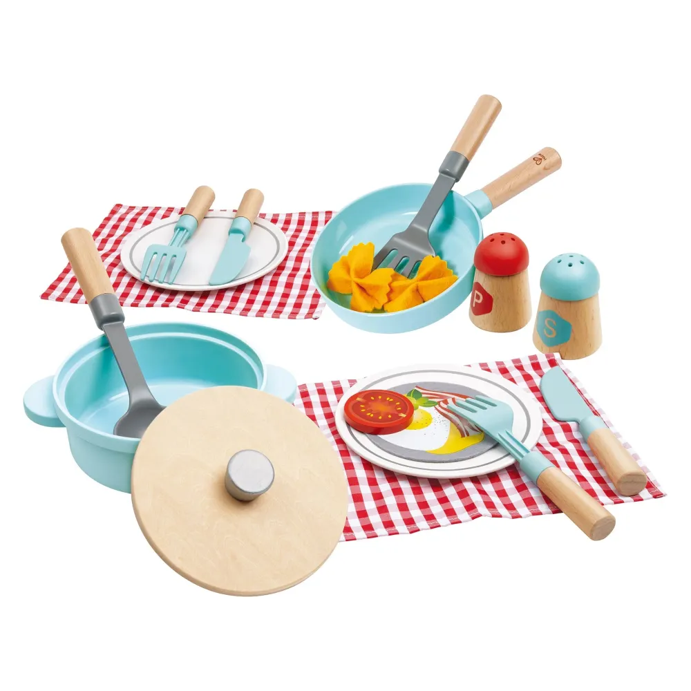 Olla para cocinar y platos para servir