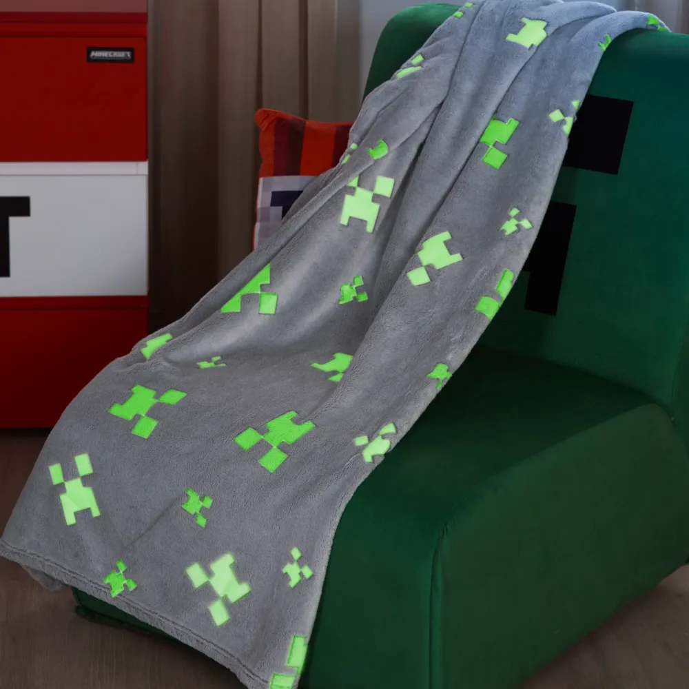 Manta suave 'Minecraft' con efecto brilla en oscuridad – Gris claro / Verde